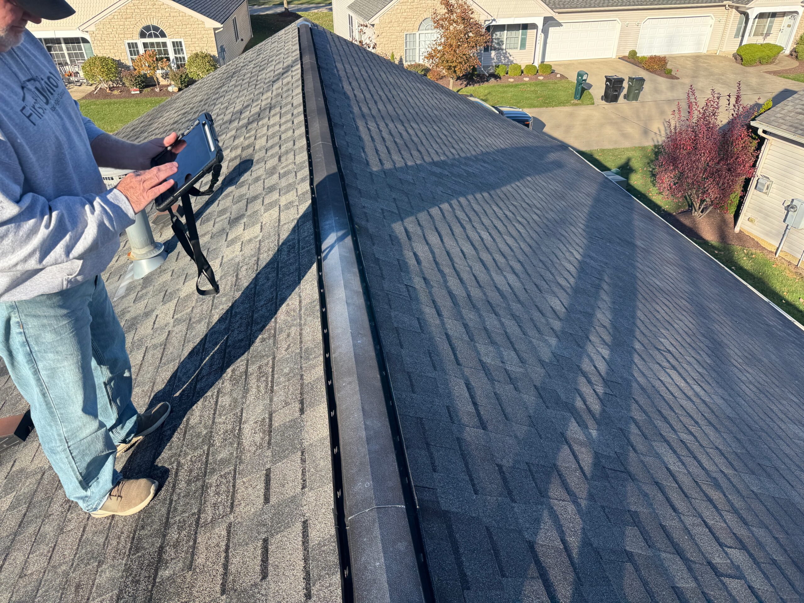 man conducting roof inspection in cleveland