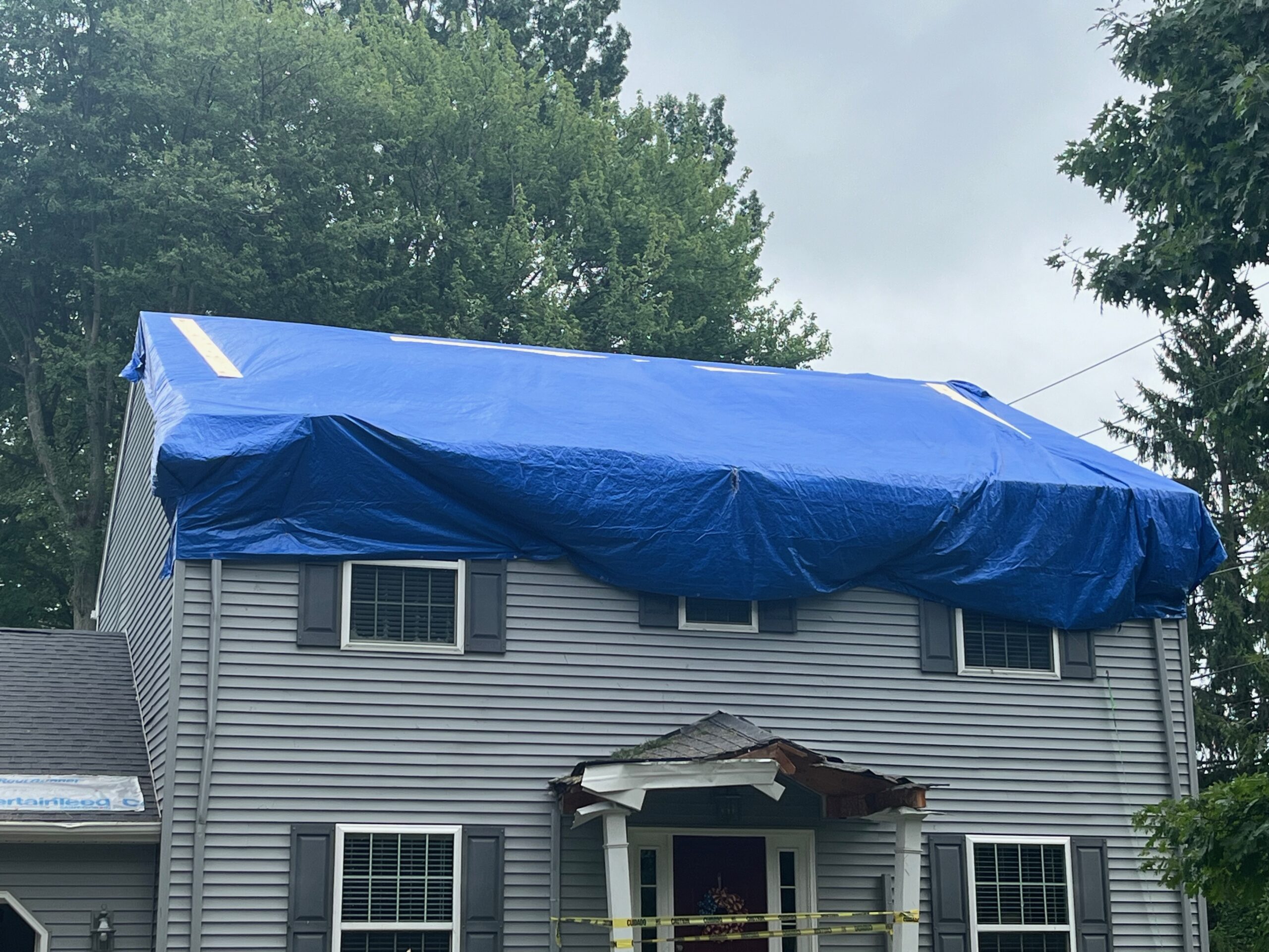 emergency roof tarp storm damage Cleveland