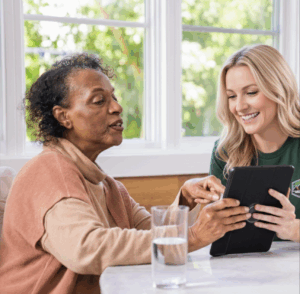 "Homeowners talking with roofing contractor about new roof installation"