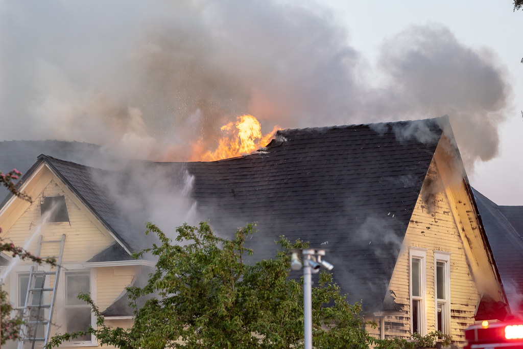Can a Neighbor’s House Fire Damage Your Roof