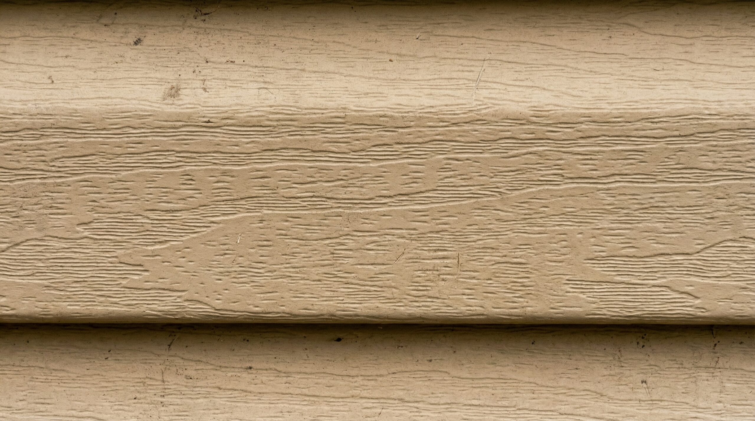 Close-up of Mastic siding texture and color detail