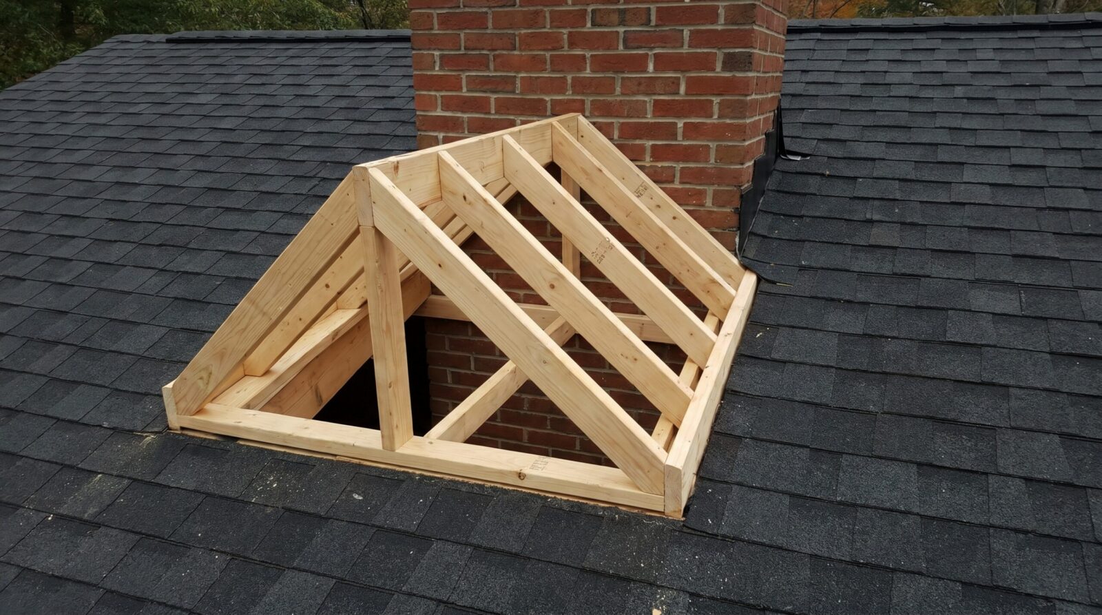 Step by step cricket installation showing framing and flashing